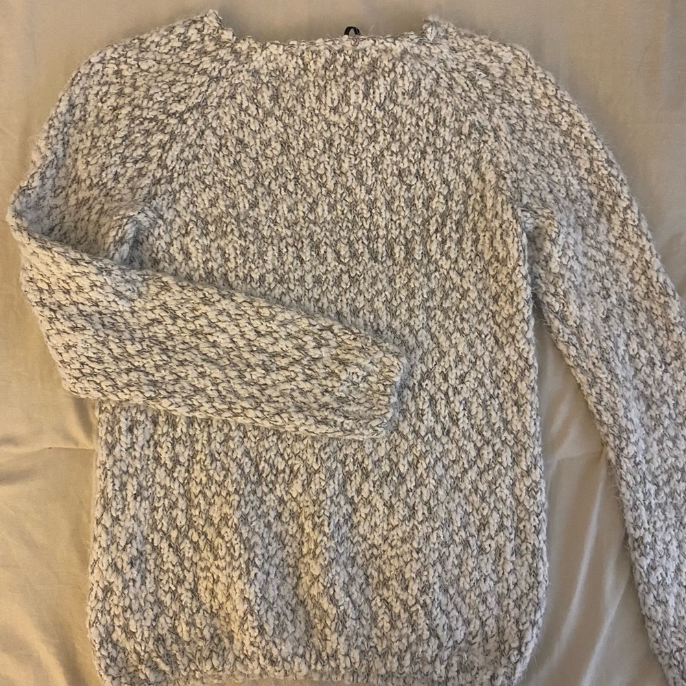 White and gray sweater